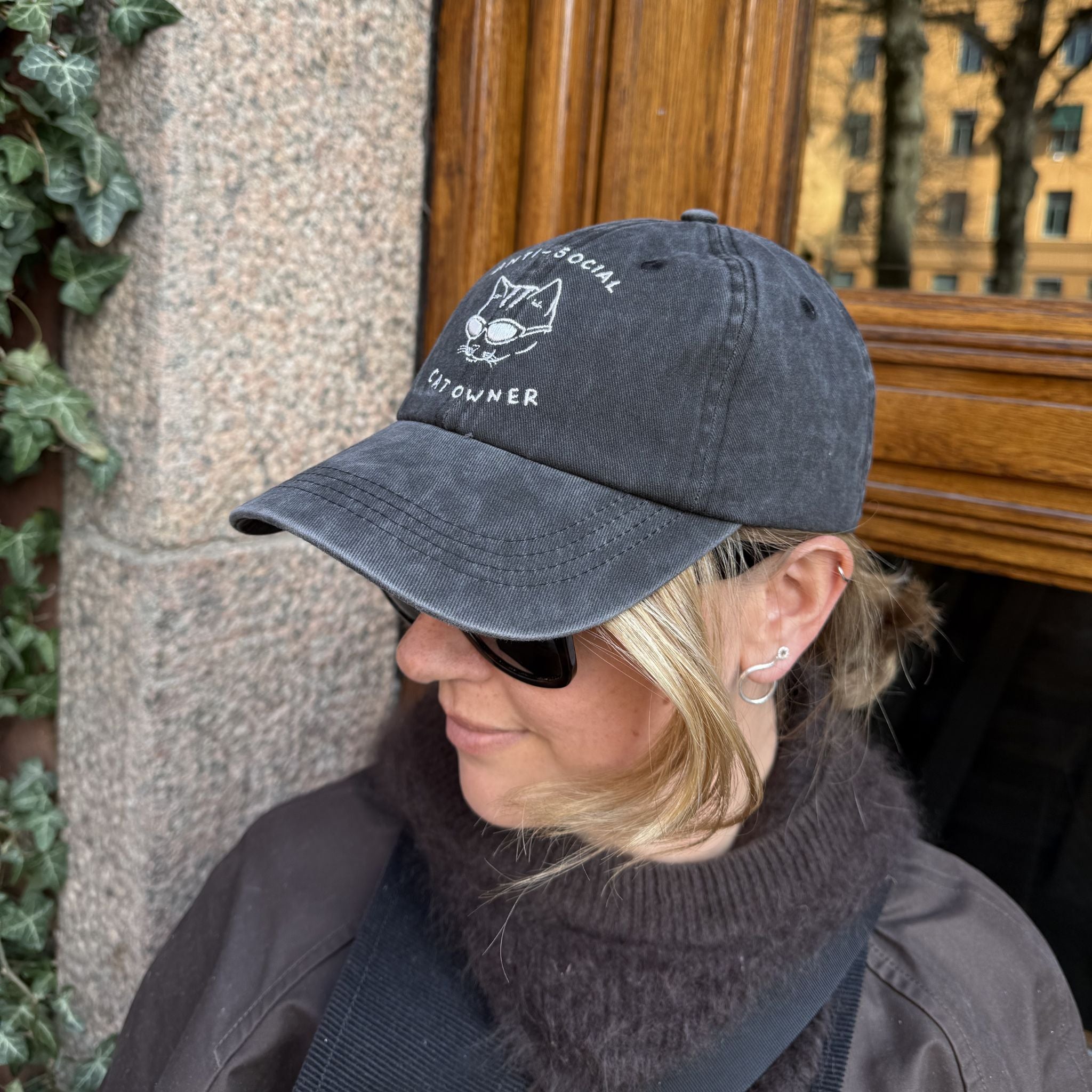 black-denim-cap-anti-social-cat-logo-woman-wearing-closeup.jpg