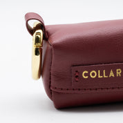 Burgunderfarbener Kotbeutelspender