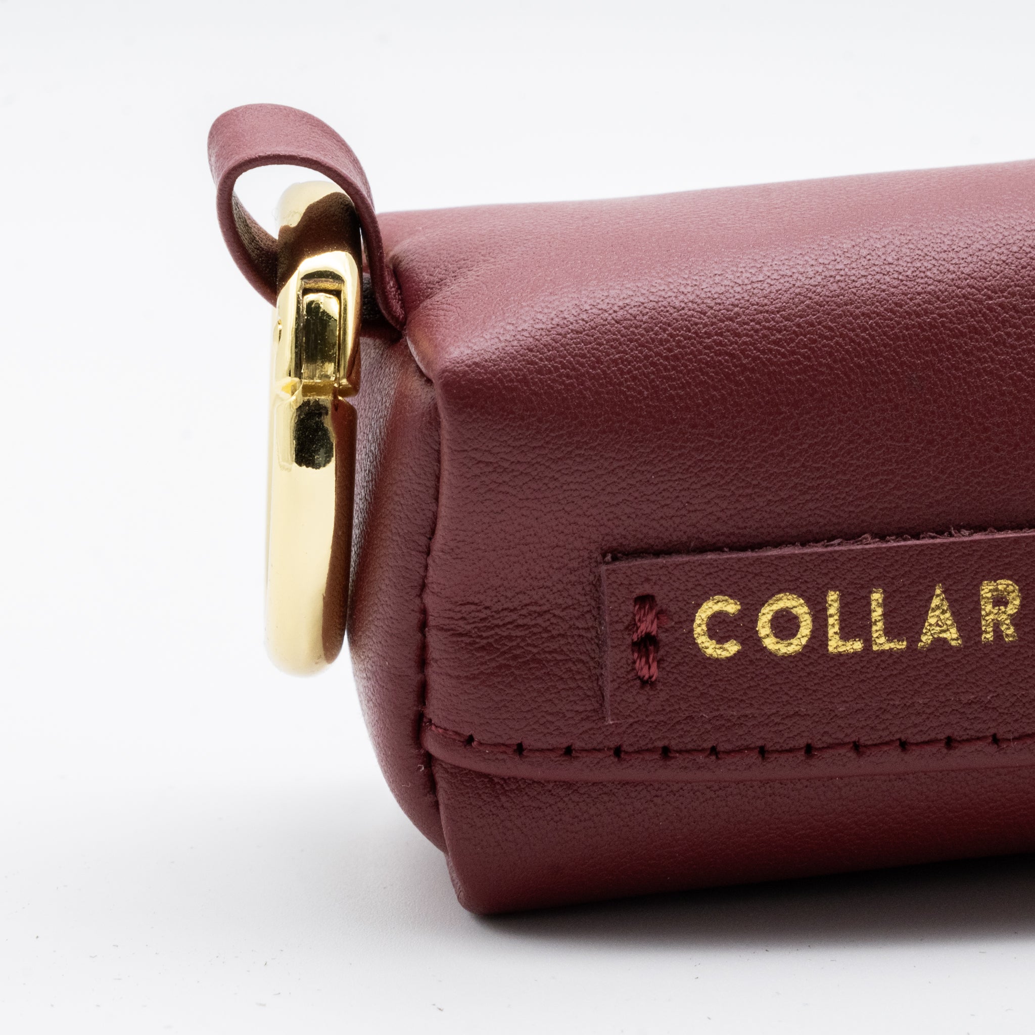 Burgunderfarbener Kotbeutelspender